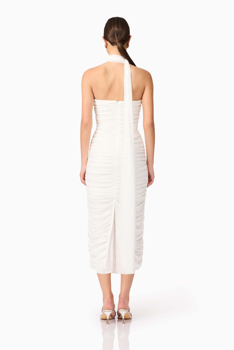 Brunette model wearing Darya Fitted Midi Dress in White back shot