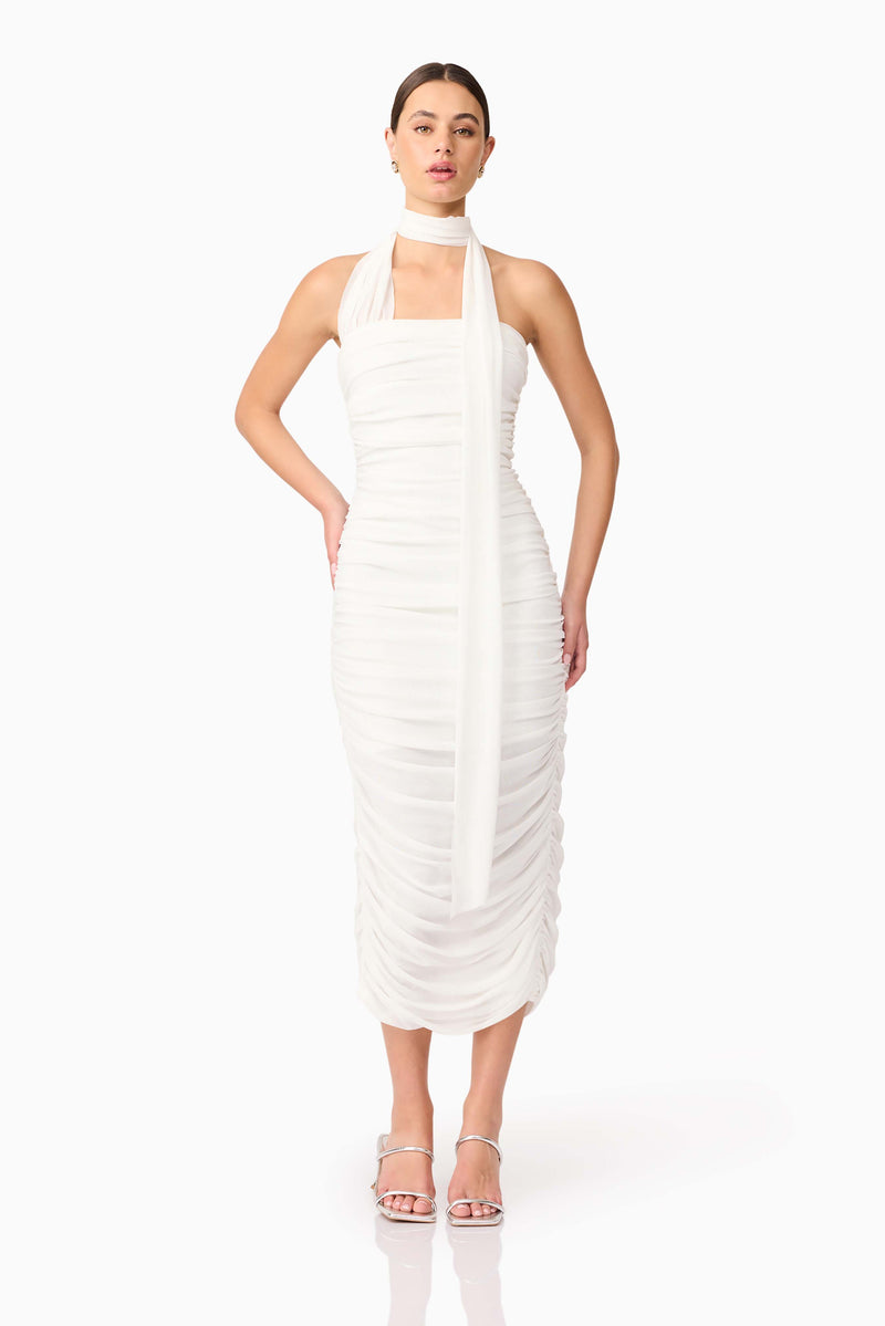 Brunette model wearing Darya Fitted Midi Dress in White posed shot