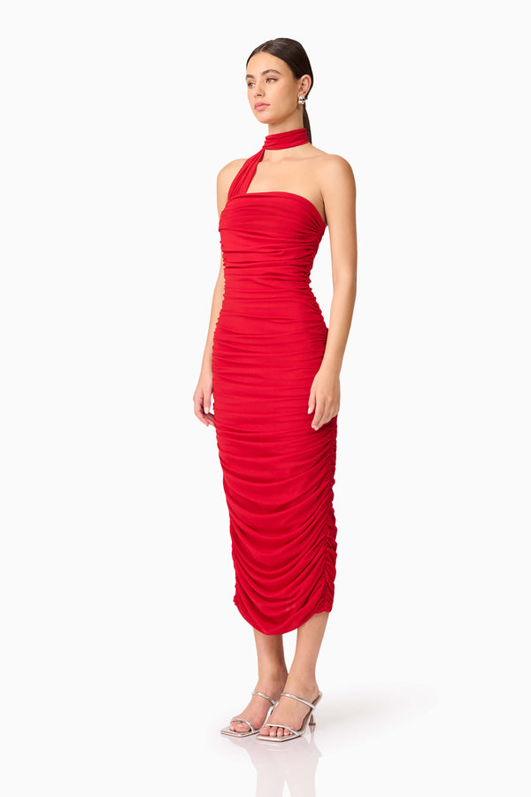 Brunette model wearing Darya Fitted Midi Dress in Red side shot