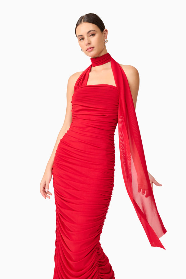Brunette model wearing Darya Asymmetrical Gown in Red close up shot