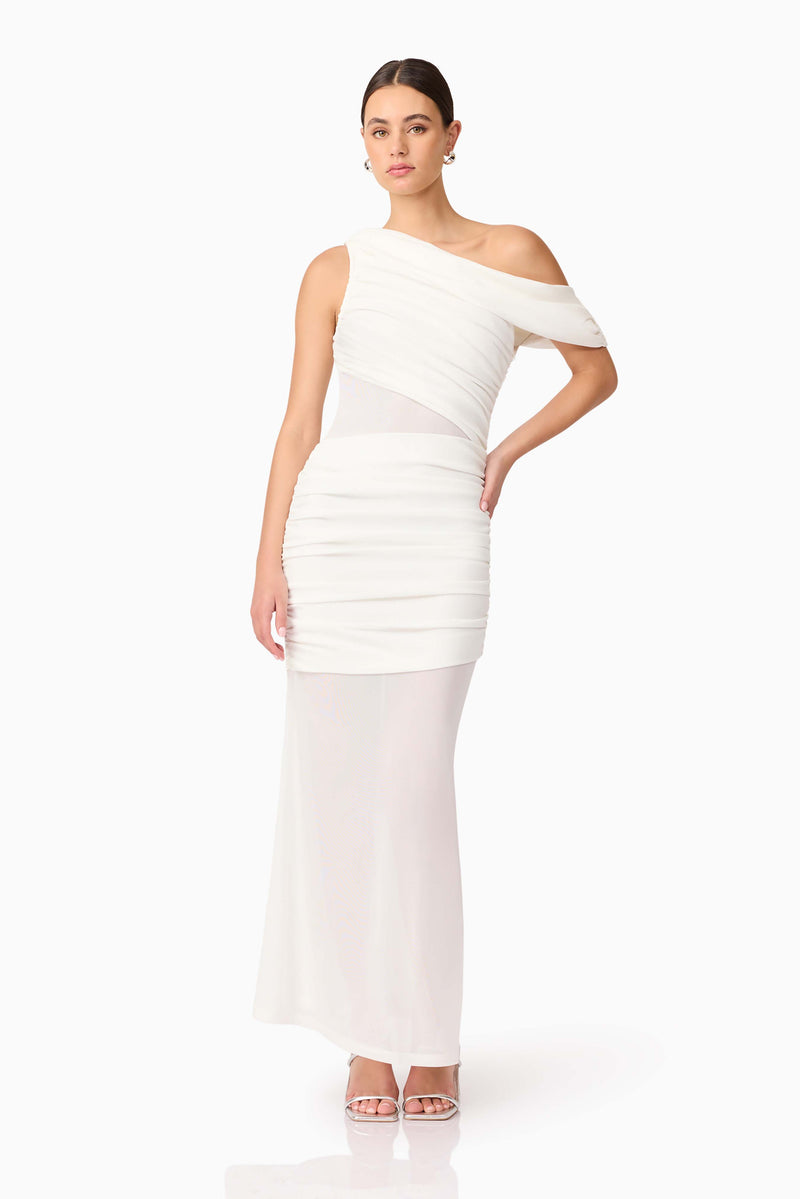 Brunette model wearing Darya Asymmetrical Gown in White posed shot