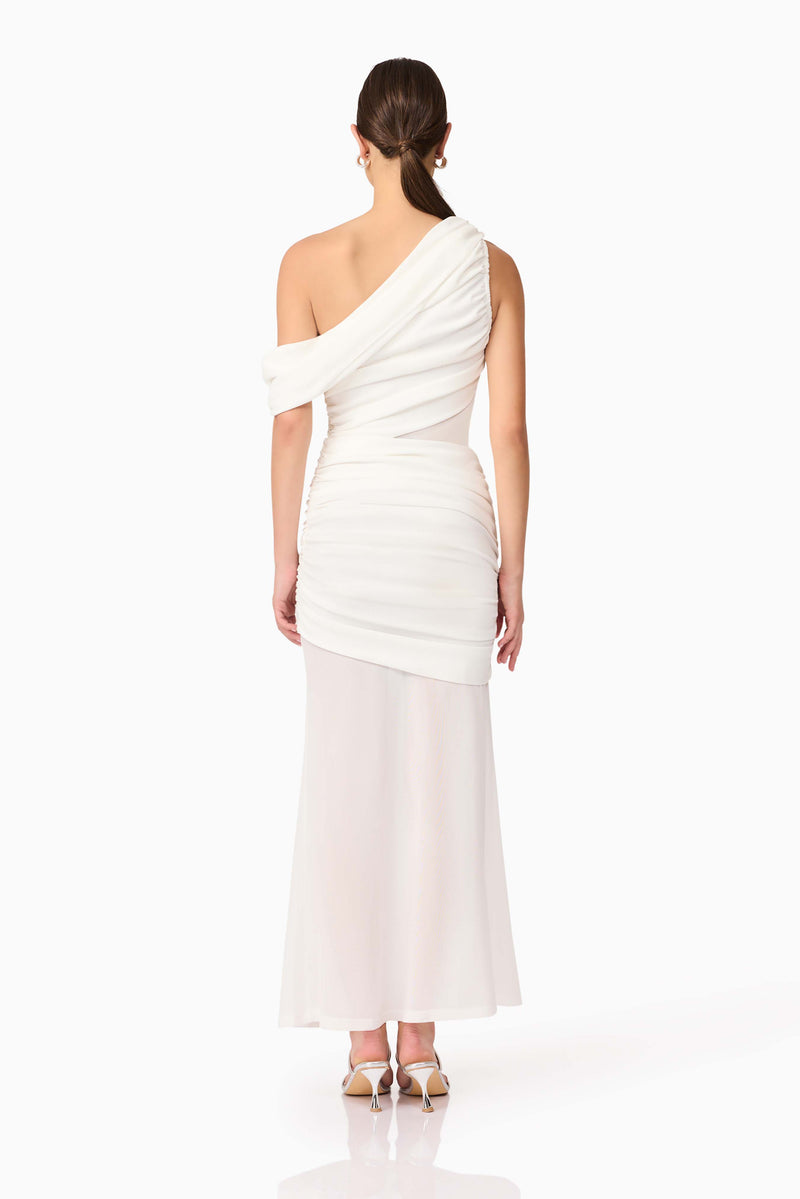 Brunette model wearing Darya Asymmetrical Gown in White back shot