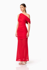 Brunette model wearing Darya Asymmetrical Gown in Red side shot