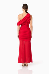Brunette model wearing Darya Asymmetrical Gown in Red back shot