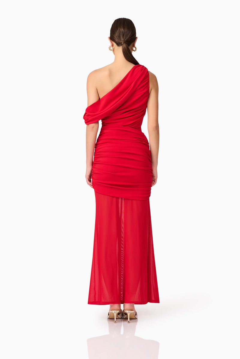 Brunette model wearing Darya Asymmetrical Gown in Red back shot