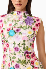 Brunette Model Wearing Rosette Sleeveless Mini Dress in Multi Floral Close Up Detail Shot