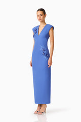 Brunette model wearing the Talitha Column Maxi Dress in Cornflower Blue side shot