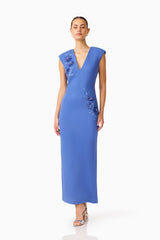 Brunette model wearing the Talitha Column Maxi Dress in Cornflower Blue posed shot