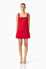 Brunette Model wearing Lucetta Shift Mini Dress in Red front shot