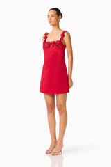Brunette Model wearing Lucetta Shift Mini Dress in Red side shot