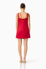 Brunette Model wearing Lucetta Shift Mini Dress in Red back shot