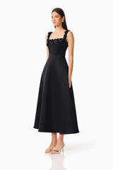 Brunette Model wearing the Lucetta Fit & Flare Midi Dress in Black side shot