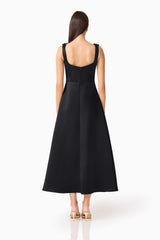 Brunette Model wearing the Lucetta Fit & Flare Midi Dress in Black back shot