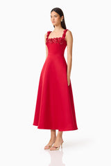 Brunette Model wearing the Lucetta Fit & Flare Midi Dress in Red side shot