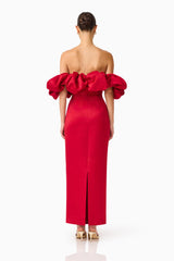 Brunette model wearing the Lucetta Off Shoulder Gown in Red back shot