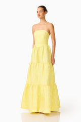 Brunette Model wearing the Luella Strapless Gown in Yellow side shot