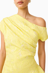 Brunette Model wearing Luella Asymmetrical Gown in Yellow close up detail shot