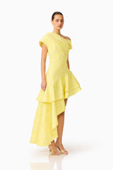Brunette Model wearing Luella Asymmetrical Gown in Yellow full side shot