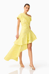 Brunette Model wearing Luella Asymmetrical Gown in Yellow walking shot