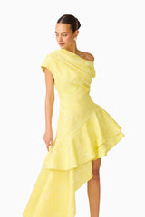 Brunette Model wearing Luella Asymmetrical Gown in Yellow posed head turn shot