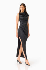 Brunette model wearing the Coralie Maxi Gown in Black posed walking shot 
