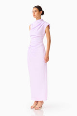 Brunette model wearing the Coralie Maxi Gown in Purple side shot