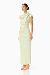 Brunette model wearing the Coralie Maxi Gown in Sage Green side shot