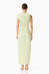Brunette model wearing the Coralie Maxi Gown in Sage Green back shot