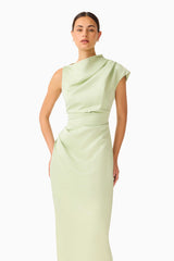 Brunette model wearing the Coralie Maxi Gown in Sage Green close up shot