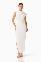 Brunette model wearing the Coralie Maxi Gown in Pearl White posed shot 