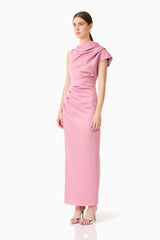 Brunette model wearing Coralie Maxi Gown in Pink side shot 