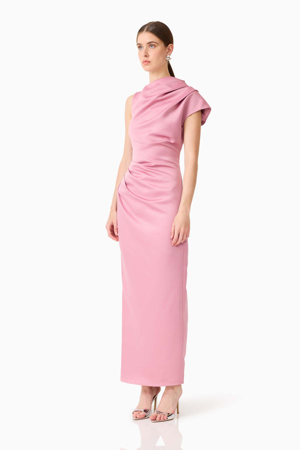 Brunette model wearing Coralie Maxi Gown in Pink side shot 