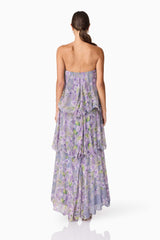 Brunette model wearing Milena Strapless Maxi Dress in Purple Floral back shot
