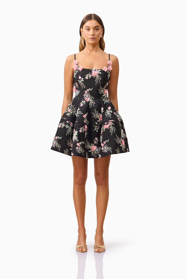 Brunette model wearing Gaia Floral Mini Dress in Black front shot
