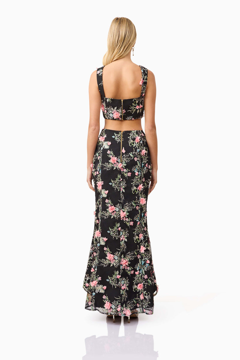 Blonde model wearing Gaia Floral Set in Black back shot
