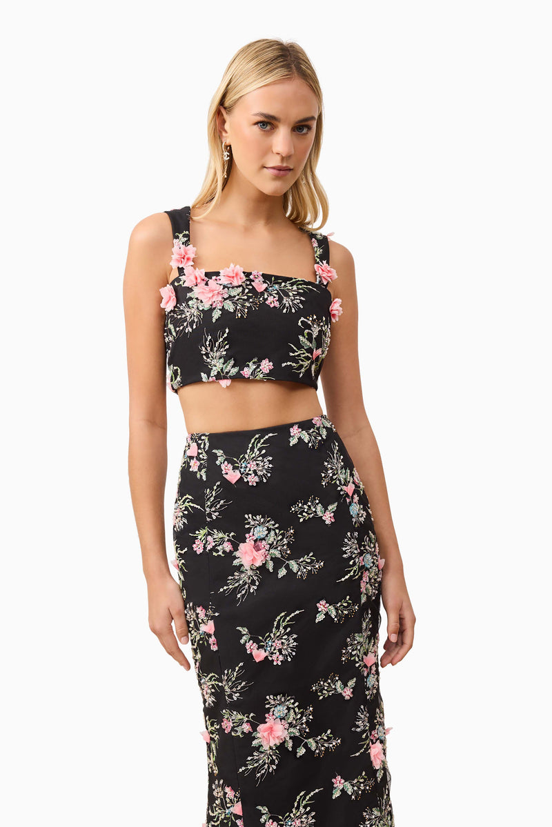 Blonde model wearing Gaia Floral Set in Black close up shot