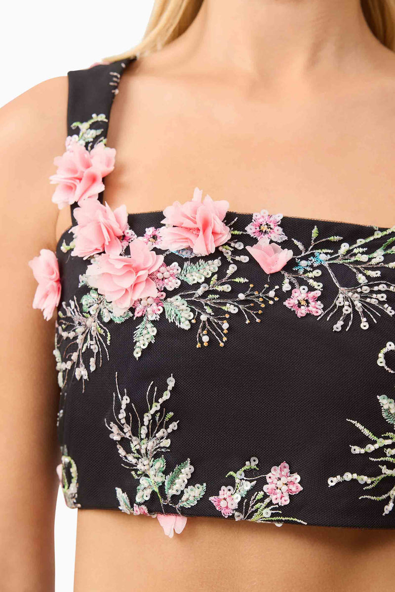 Blonde model wearing Gaia Floral Set in Black top detail shot