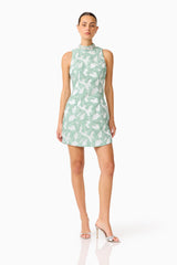 Lisette High Neck Mini Dress in Sea Green with jacquard fabrication and shift dress style posed shot