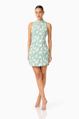 Lisette High Neck Mini Dress in Sea Green with jacquard fabrication and shift dress style posed fornt shot