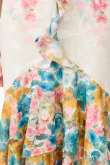 Clementina Ruffle Maxi Dress in Multi Floral with v-neckline & tiered ruffle skirt detail shot