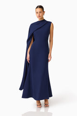 Leonara Asymmetric Cape Maxi Dress in Deep Navy with high neckline posed shot