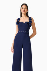 Leonara Sleeveless Jumpsuit in Deep Navy with floral appliques and a belt close up shot