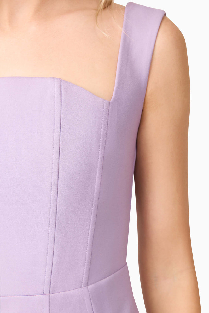 Blonde model wearing Alina Corset Mini Dress in Purple detail shot