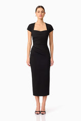 Brunette model wearing the Alina Fitted Midi Dress in Black front shot