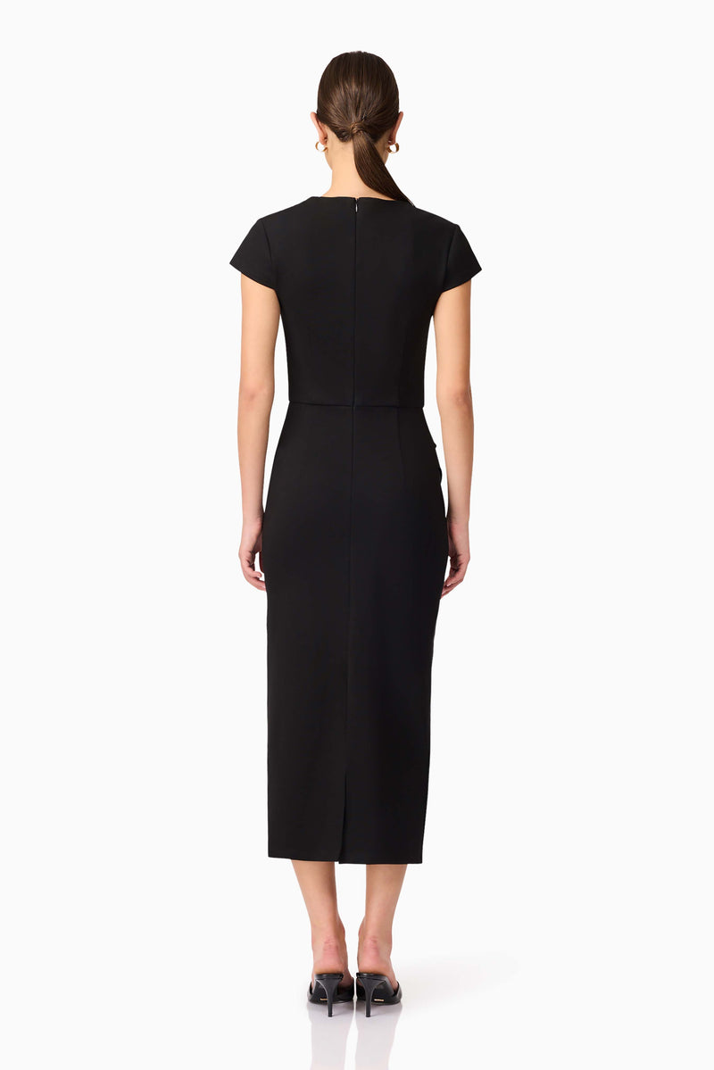 Brunette model wearing the Alina Fitted Midi Dress in Black back shot