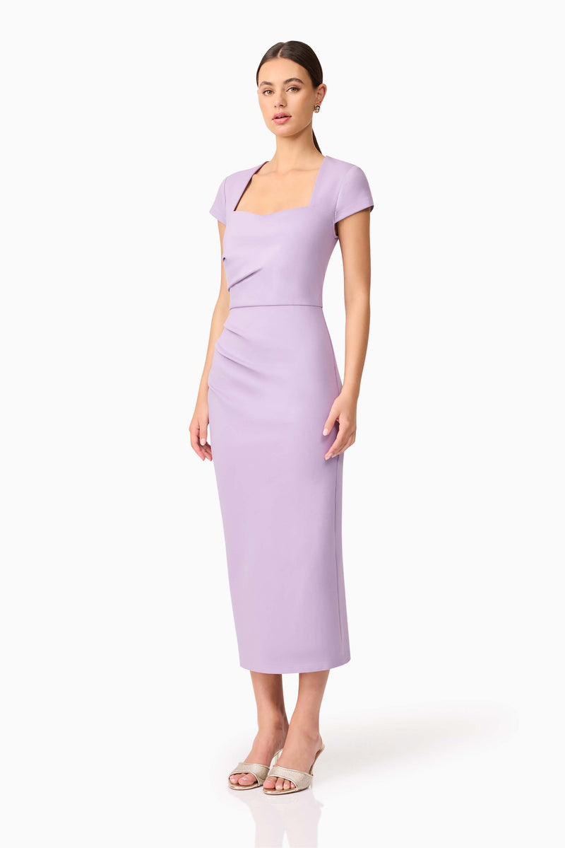 Brunette model wearing Alina Fitted Midi Dress in Purple side shot
