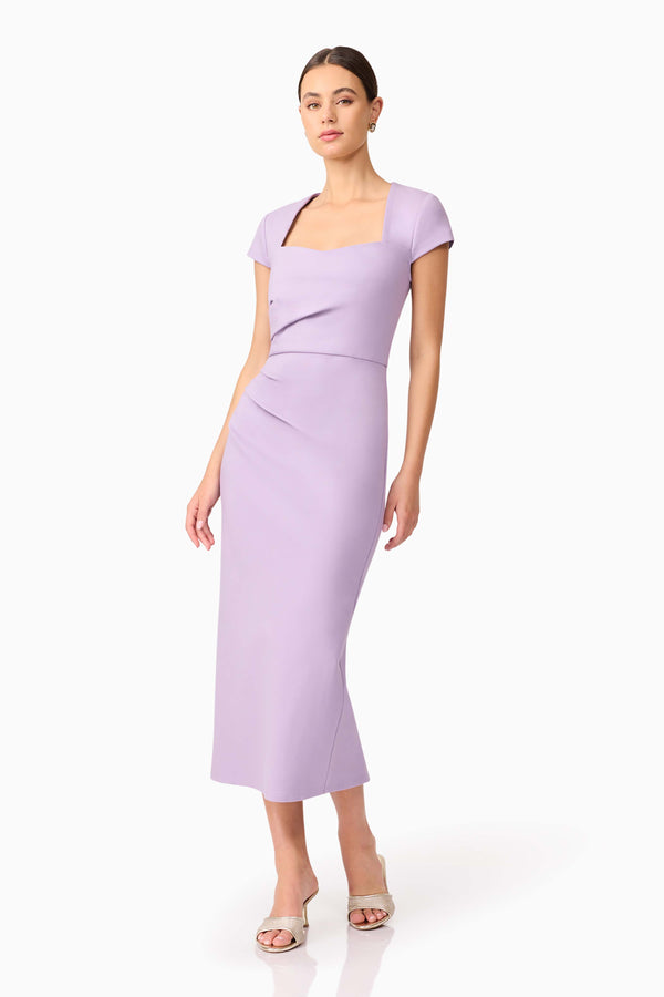 Brunette model wearing Alina Fitted Midi Dress in Purple posed shot