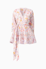 Brunette model wearing Ines Long Sleeve Mini Dress in Purple Floral ghost imagery