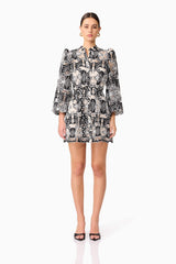 Brunette model wearing Jolie Long Sleeve Mini Dress in Black front shot