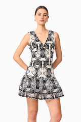 Brunette model wearing Jolie Floral Mini Dress in Black posed shot